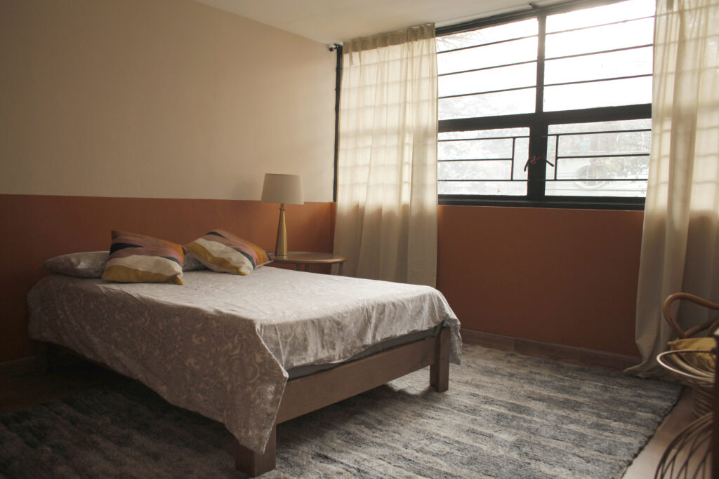 Bedroom with warm, modern decor