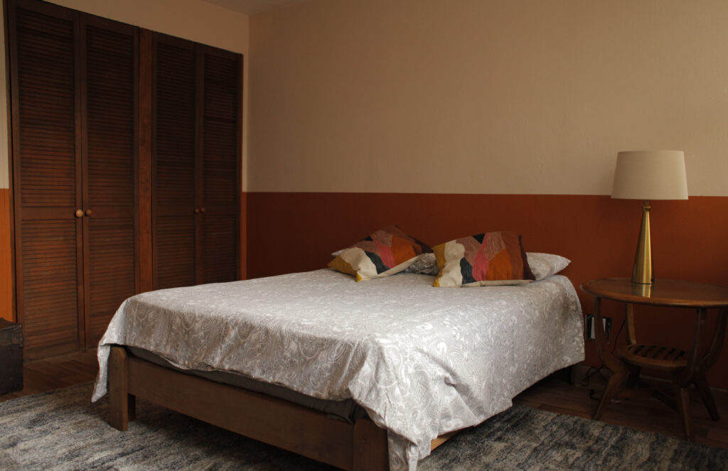 Bedroom with warm, modern decor