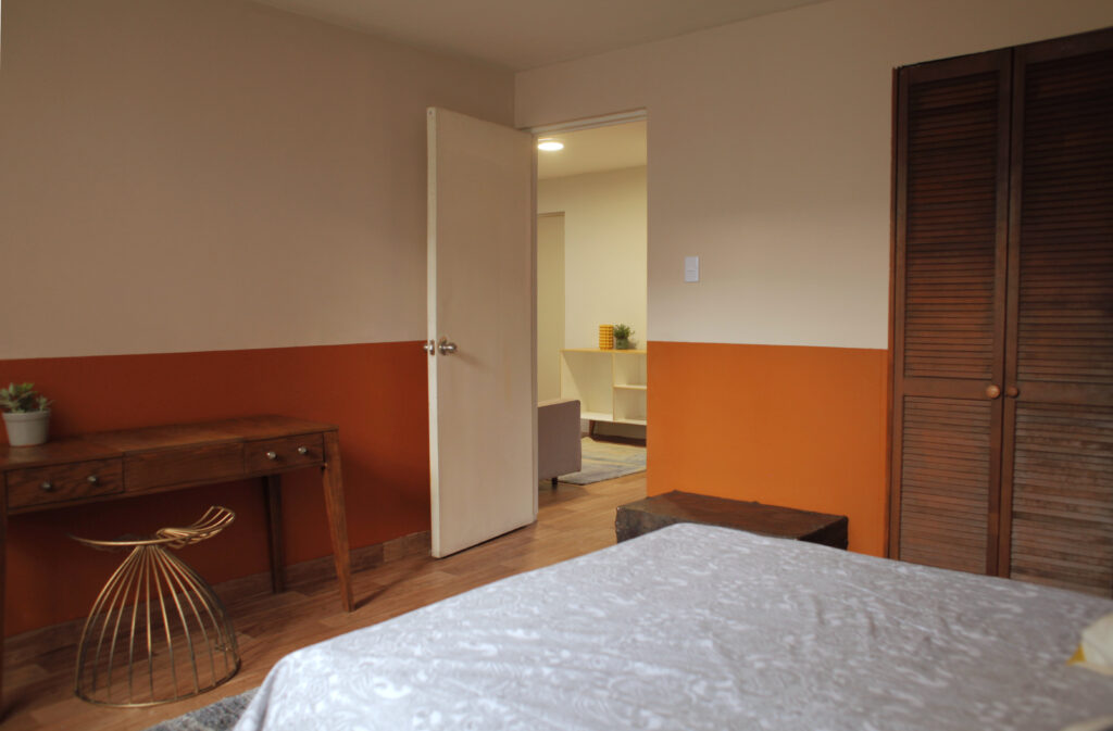 Bedroom with warm, modern decor